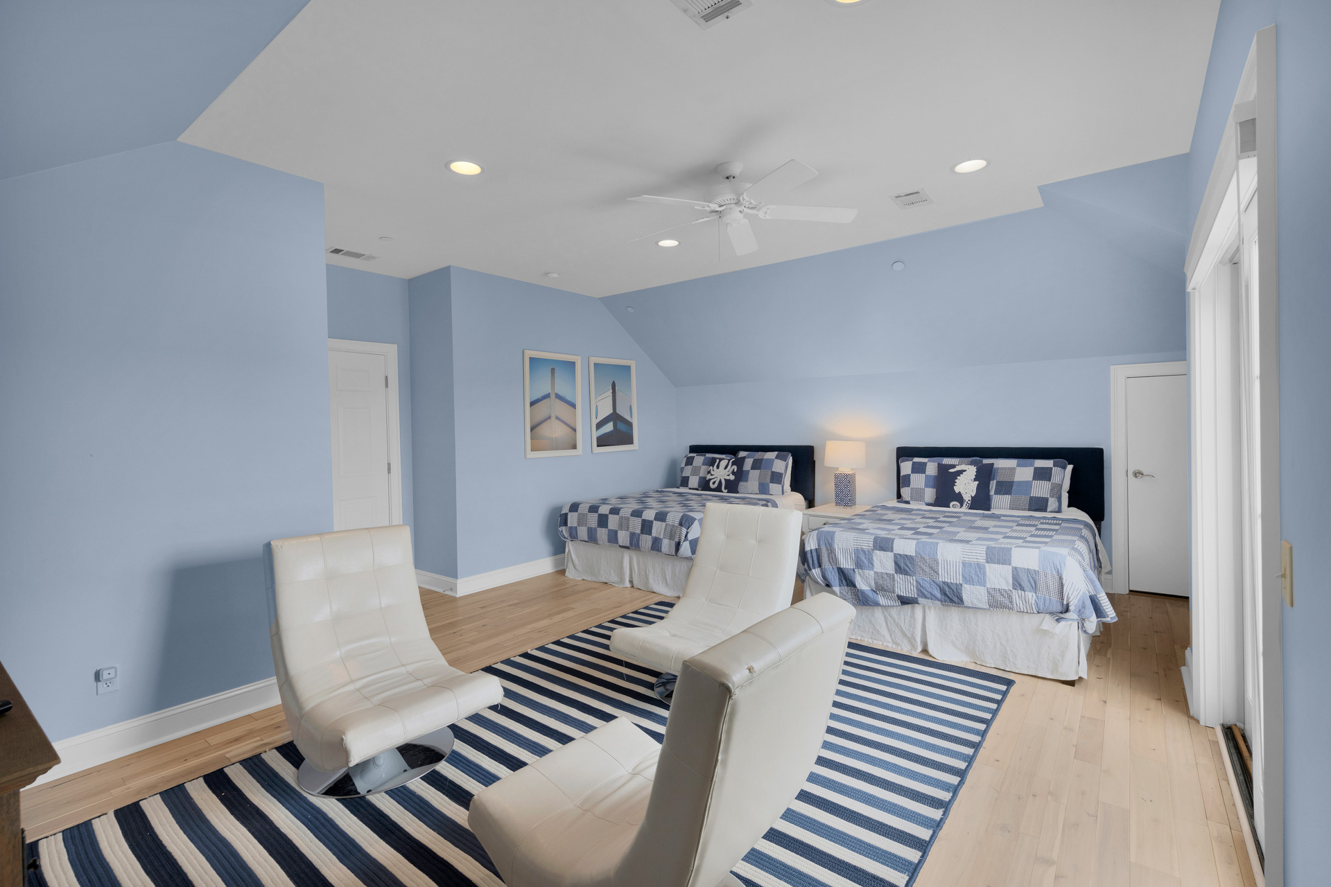 Queen bedroom with gaming chairs